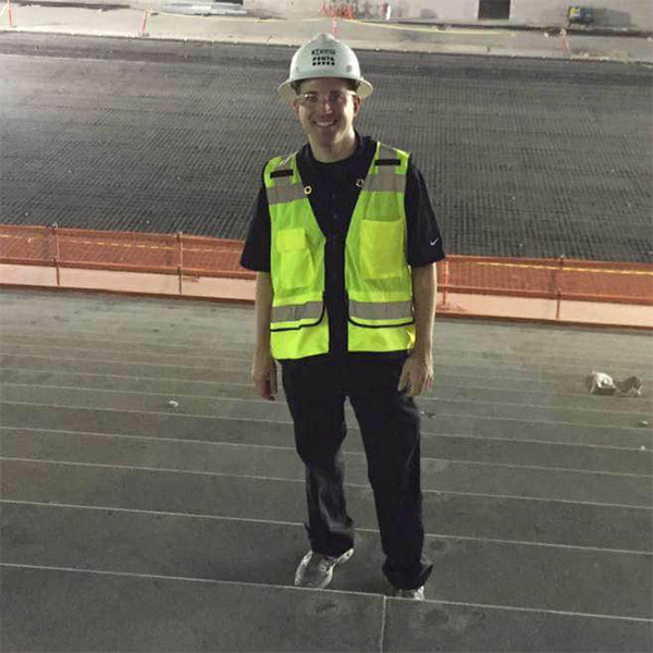 STHM alum Rick Olivieri wears a hard hat inside what would become T-Mobile Arena, which opened in April 2016 and could later host an NHL franchise. (Courtesy Rick Olivieri)