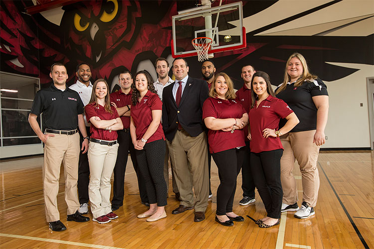 Students from STHM’s Master of Science in Sport Business program have earned industry experience in partnership with Temple University Director of Athletics Dr. Pat Kraft, center, and Temple's Department of Athletics. (Temple University Photography)