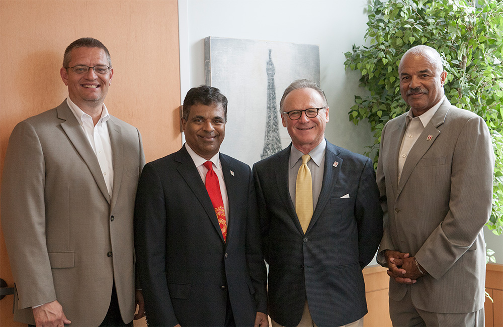 Temple University alumnus Harith Wickrema, second from left, has created an endowed scholarship at the School of Sport, Tourism and Hospitality Management. Joining him, from left, are STHM Associate Dean Aubrey Kent, STHM Dean M. Moshe Porat, and STHM Director of Alumni Engagement Jeffrey Montague (Laurel Harrish)