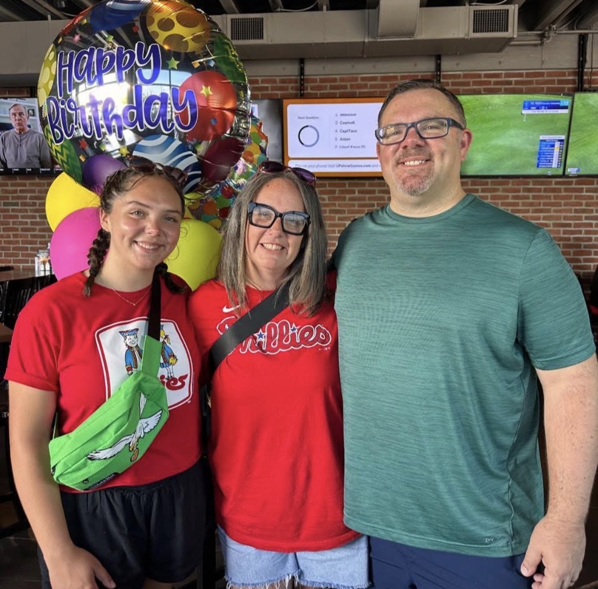 Megan Gochenauer with her parents. 