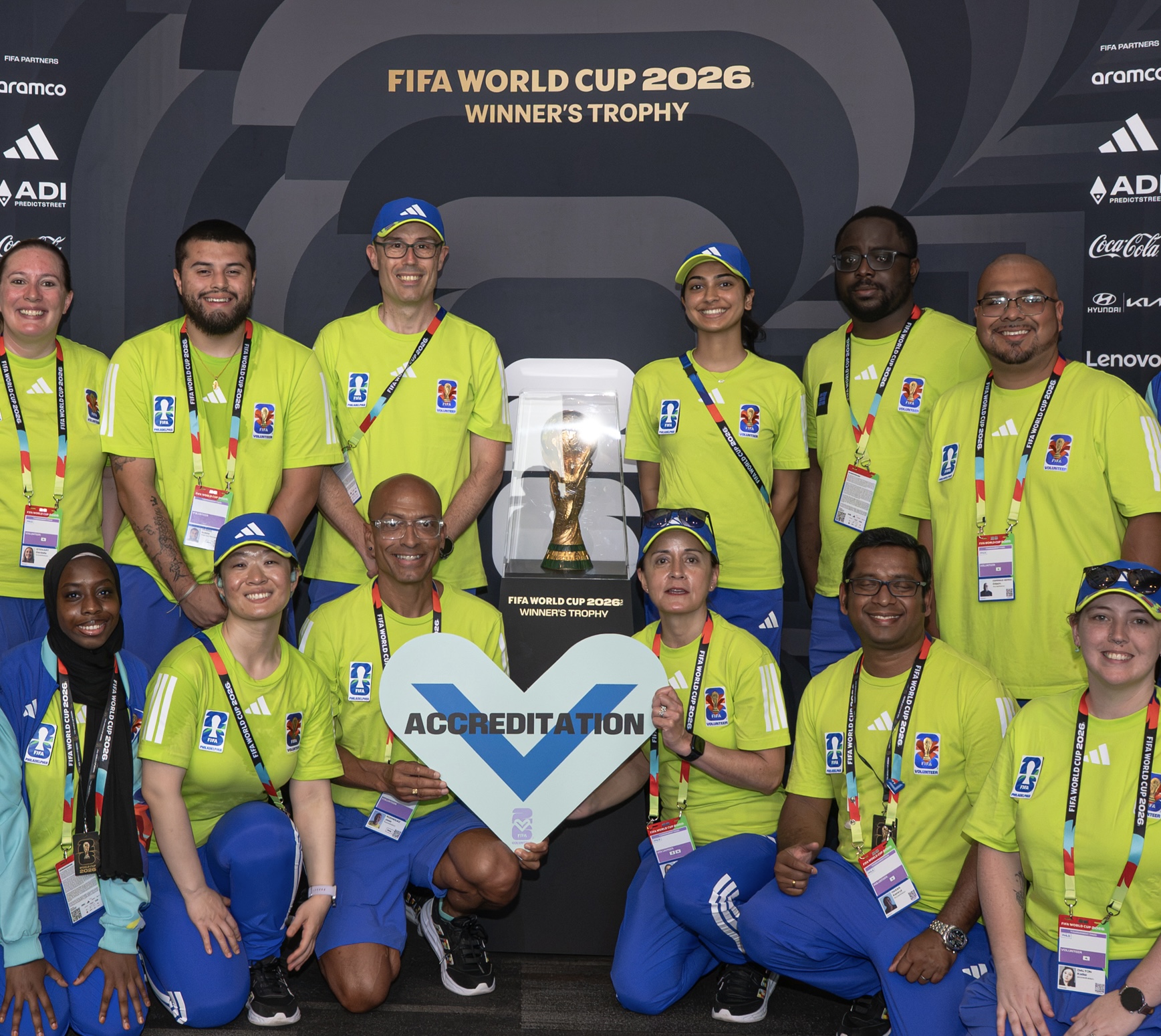 Stuti Vishwanathan and members of the accreditation team with the FIFA World Cup 2026 winner’s trophy.